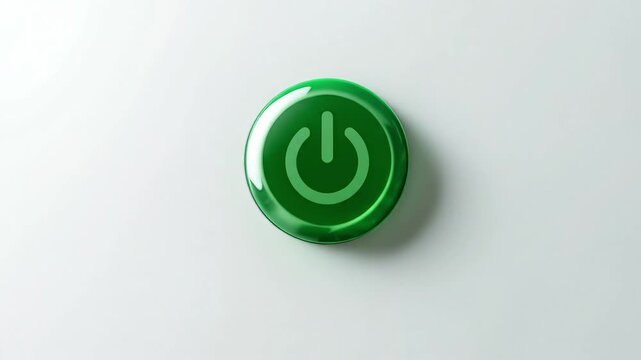 A glossy green power button with the universal power symbol on a white background.