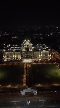 Aerial night & vertical shot of Secretariat of Telangana in Hyderabad, India