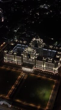 Aerial night & vertical shot of Secretariat of Telangana in Hyderabad, India