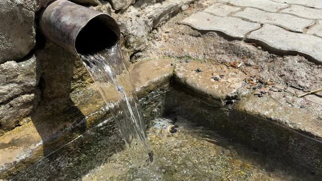 Natural Forest Stream Flowing from a Spring Realistic Waterfall, Fountain Cascade, Ripple Mist in a Woodland Landscape Fresh Water Source Scenic Nature Footage