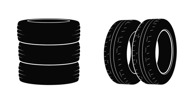 Stack of tires and two tires black silhouette on white background