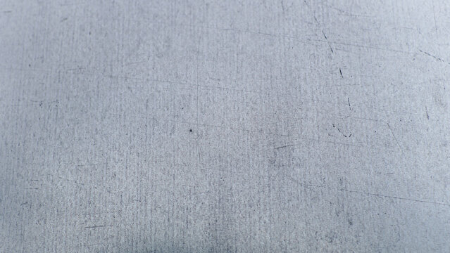 Close up of Scratched Brushed Metal Surface Texture in Gray
