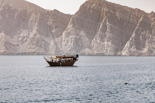 Traditional Dhow Cruise with Dolphins Through the Scenic Fjords of Musandam, Oman