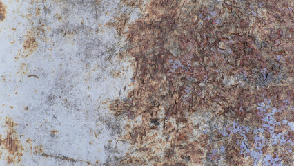 Grungy Metal Sheet Showing Extensive Rust and Cracked Paint Layers © yashis007