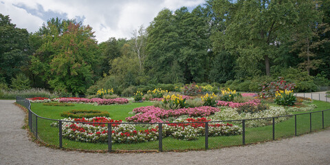 Fototapeta premium flower bed and trees of Tiergarten park, Berlin, Germany 