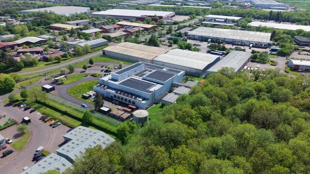 Drone perspective of a secure cloud computing server facility showcasing roof cooling infrastructure England