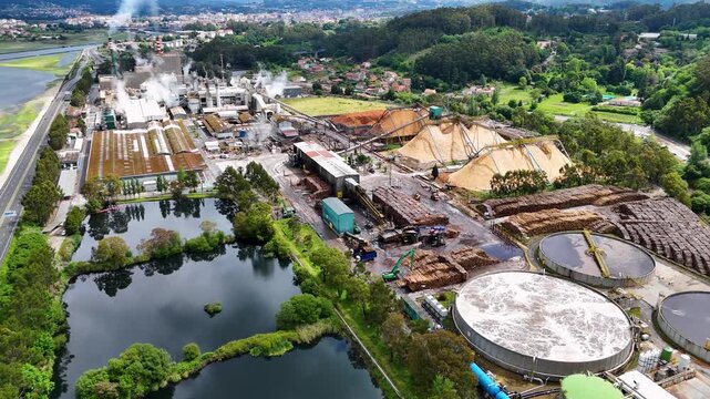 Aerial view of paper mill and wood processing plant
