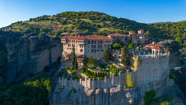 Aerial View of the Historic Varlaam Monastery Perched on Giant Cliffs in Meteora Greece