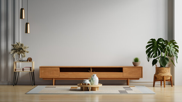 Empty white wall mockup with wooden TV cabinet, indoor plants and modern home decor for living room interior design- 3D rendering