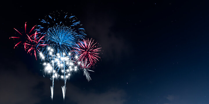 Red and Blue Fireworks on night background
