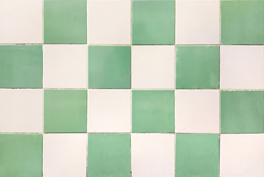 Close up of old vintage green and white porcelain tiles. Colonial heritage tiles commonly found in old houses. Suitable for floor tiles, wall, and building materials. Seamless background texture