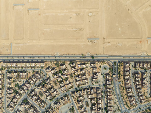 Aerial View of Residential Houses and Desert Urban Area in Modern Saudi Arabia Development