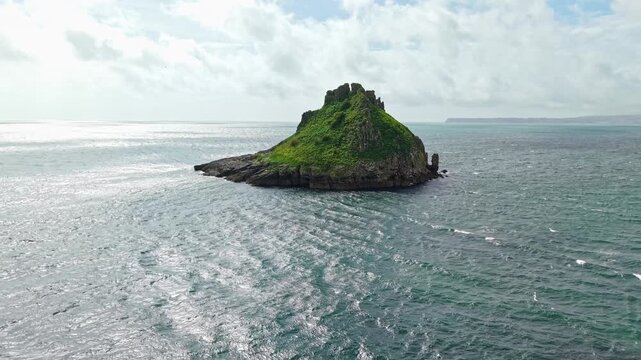Aerial view of Thatcher Rock, Historical landmark in the United Kingdom. Thatcher Rock is a key sites for studies of Quaternary stratigraphy and sea-level change and forms part of the English Riviera.
