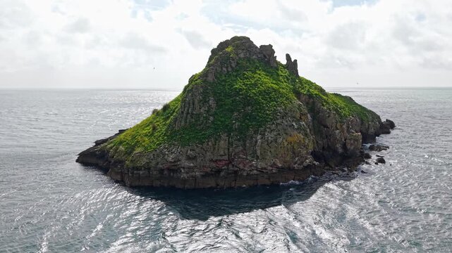 Aerial view of Thatcher Rock, Historical landmark in the United Kingdom. Thatcher Rock is a key sites for studies of Quaternary stratigraphy and sea-level change and forms part of the English Riviera.
