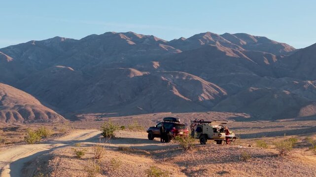 View an aerial perspective of a teardrop camper and SUV camping along the Thimble trail in Anza Borego Desert State Park in California
