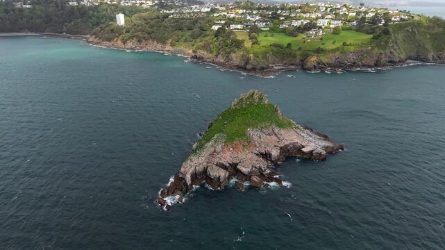 Aerial view of Thatcher Rock, Historical landmark in the United Kingdom. Thatcher Rock is a key sites for studies of Quaternary stratigraphy and sea-level change and forms part of the English Riviera.