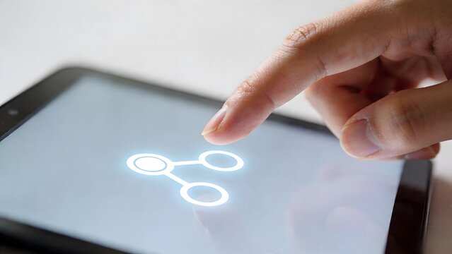A finger touches a share icon on a tablet screen.