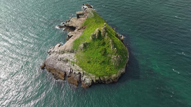 Aerial view of Thatcher Rock, Historical landmark in the United Kingdom. Thatcher Rock is a key sites for studies of Quaternary stratigraphy and sea-level change and forms part of the English Riviera.