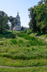 Naklejka premium View of the ravines and thickets of the town of Uglich with a church in the distance