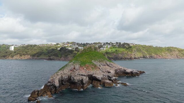 Aerial view of Thatcher Rock, Historical landmark in the United Kingdom. Thatcher Rock is a key sites for studies of Quaternary stratigraphy and sea-level change and forms part of the English Riviera.