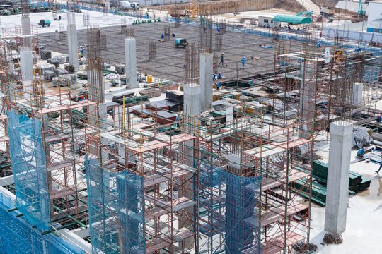 Construction site with scaffolding and workers