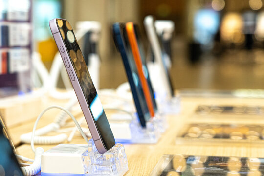 A Display of Modern Smartphones Showcasing Innovative Designs and Technology in a Retail Environment for Enthusiasts and Mobile Users