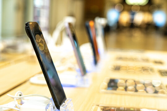 A Contemporary Display of Sleek Smartphones Showcasing Innovative Technology and Design in a Modern Retail Environment