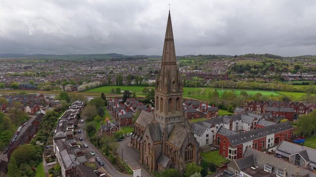 Aerial view of Exeter, which is an ancient city on the River Exe in southwest England. Drone POV of St Michael and All Angels Church, on Mount Dinham in Exeter is an Anglican church in Devon, England.