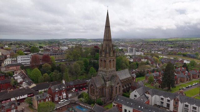Aerial view of Exeter, which is an ancient city on the River Exe in southwest England. Drone POV of St Michael and All Angels Church, on Mount Dinham in Exeter is an Anglican church in Devon, England.