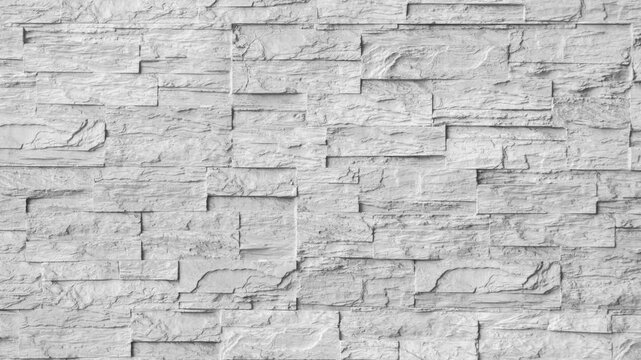 Close-up texture of white brick wall with weathered mortar lines and subtle cracks