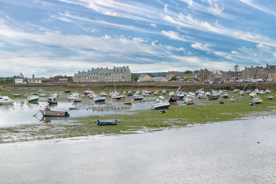 Barfleur in Normandy, the harbor, with traditional houses in background
