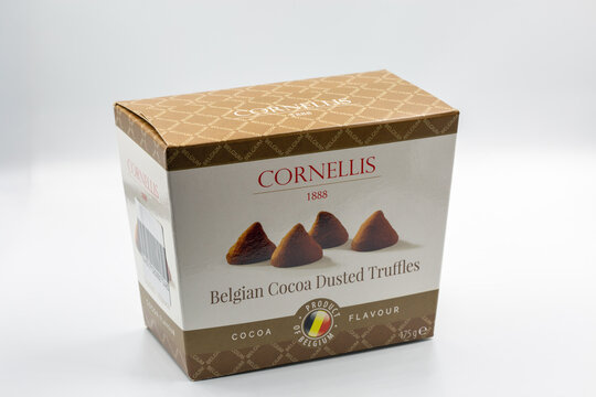 Cornellis Belgian cocoa dusted truffles box closeup on white.