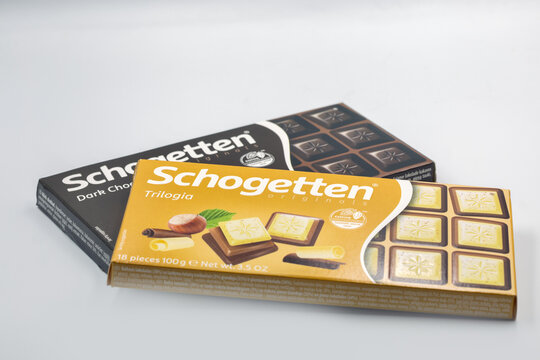 Schogetten originals dark chocolate and trilogia bars packs closeup.