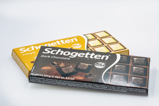 Schogetten originals dark chocolate and trilogia bars packs closeup.