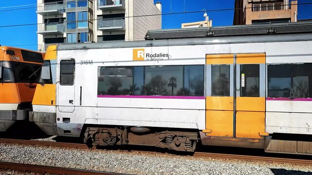 Barcelona, Spain - May 10, 2026: Coupled Commuter Train Cars