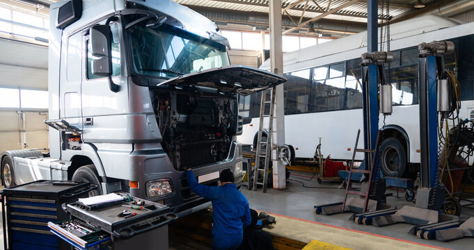 Truck repair service indoors. Maintenance workshop.