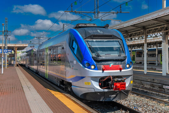 Fossano, Italy &ndash; May 6, 2026: Trenitalia Jazz regional train, model ETR 425 Alstom, stopped at station platform on sunny day. Italian railway infrastructure and commuter transport system