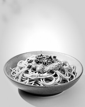 Authentic Wuhan Re Gan Mian hot dry noodles in a ceramic bowl