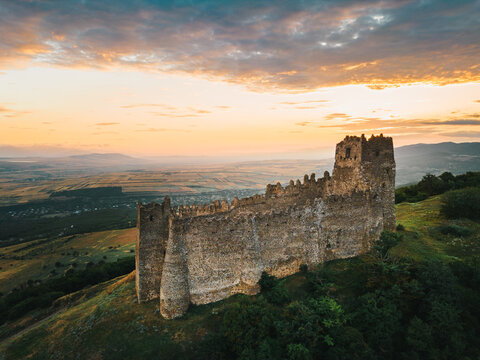Aerial circular view The Skhvilo fortress or Skhvilo castle. Medieval fortress in region of Shida Kartli, in Kaspi District, Georgia. 14th century. Served as residence of the duke family Amilakhor