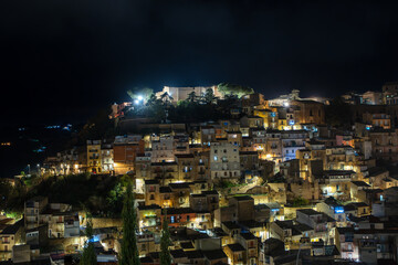 Fototapeta premium Piazza Armerina cityscape at night with the Aragonese Castle, Sicily