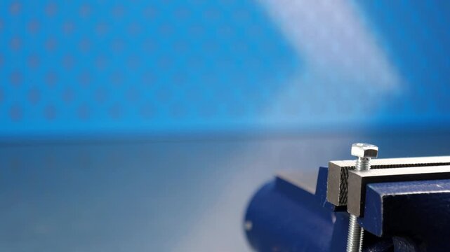 The metal screw is installed in the metal boards. 