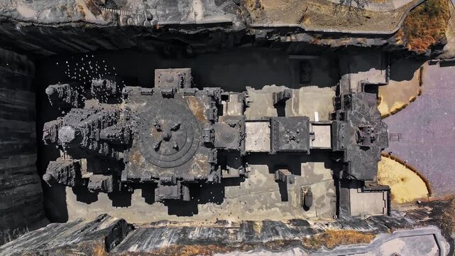 Aerial view of the Kailasa Temple at Ellora Caves in Maharashtra, India. This ancient rock-cut temple, carved from a single monolithic structure, stands as a masterpiece of Indian architecture.