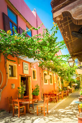 Fototapeta premium cosy street of Rethymno old town, Crete, Greece, retro toned