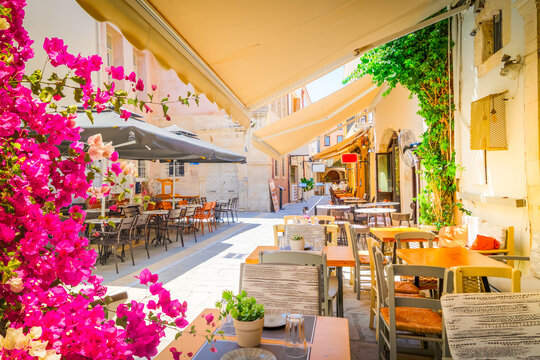 cosy street of Rethymno old town, Crete, Greece, retro toned
