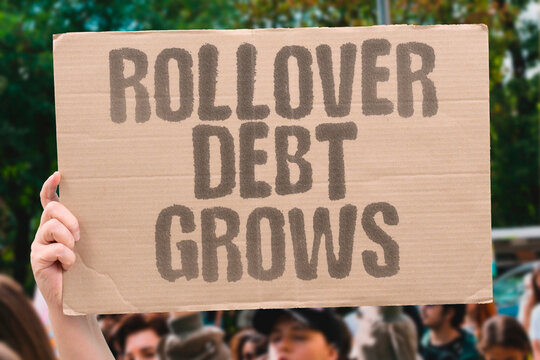 "Rollover Debt Grows" Loan rollover fees cause borrower debt to compound rapidly each cycle. LOAN. ROLLOVER. FEES. COMPOUND. RAPIDLY.
