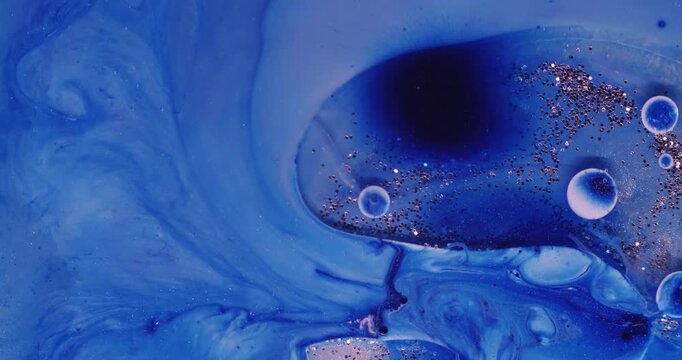 Bright sequins. Oil ink bubbles. Defocused blue color water vibrant splash round texture floating on abstract acrylic art background.