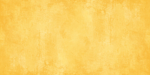 Obraz premium Yellow grunge texture background with distressed weathered effect and vintage paper parchment style for design projects