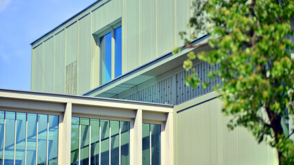 Fototapeta premium A fragment of a low-rise office building in the classical style. Modernity and tradition in office architecture.