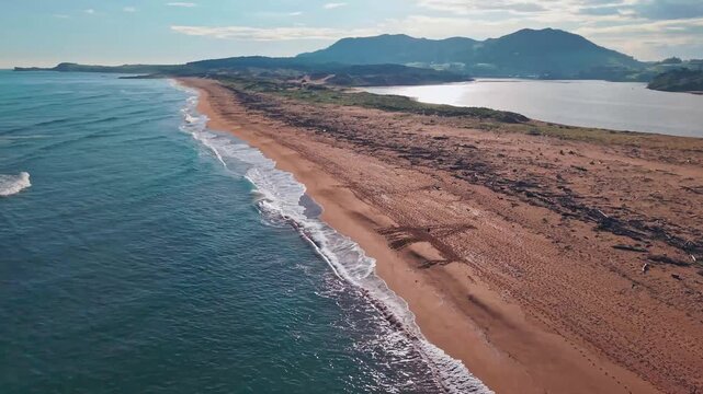 Aerial view of Liencres beach and Costa Quebrada rugged coastline in Cantabria, Spain