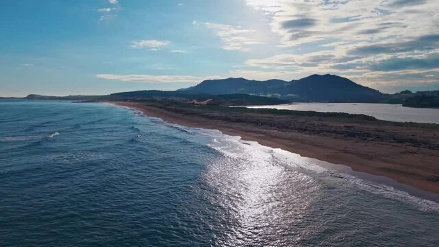 Aerial view of Liencres beach and Costa Quebrada rugged coastline in Cantabria, Spain